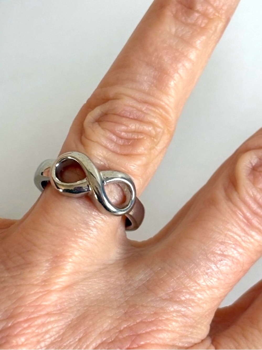 Vintage Avon Silver Tone Figure 8 Ring Size 7 - 7.5 NIB 2010 Empowerment